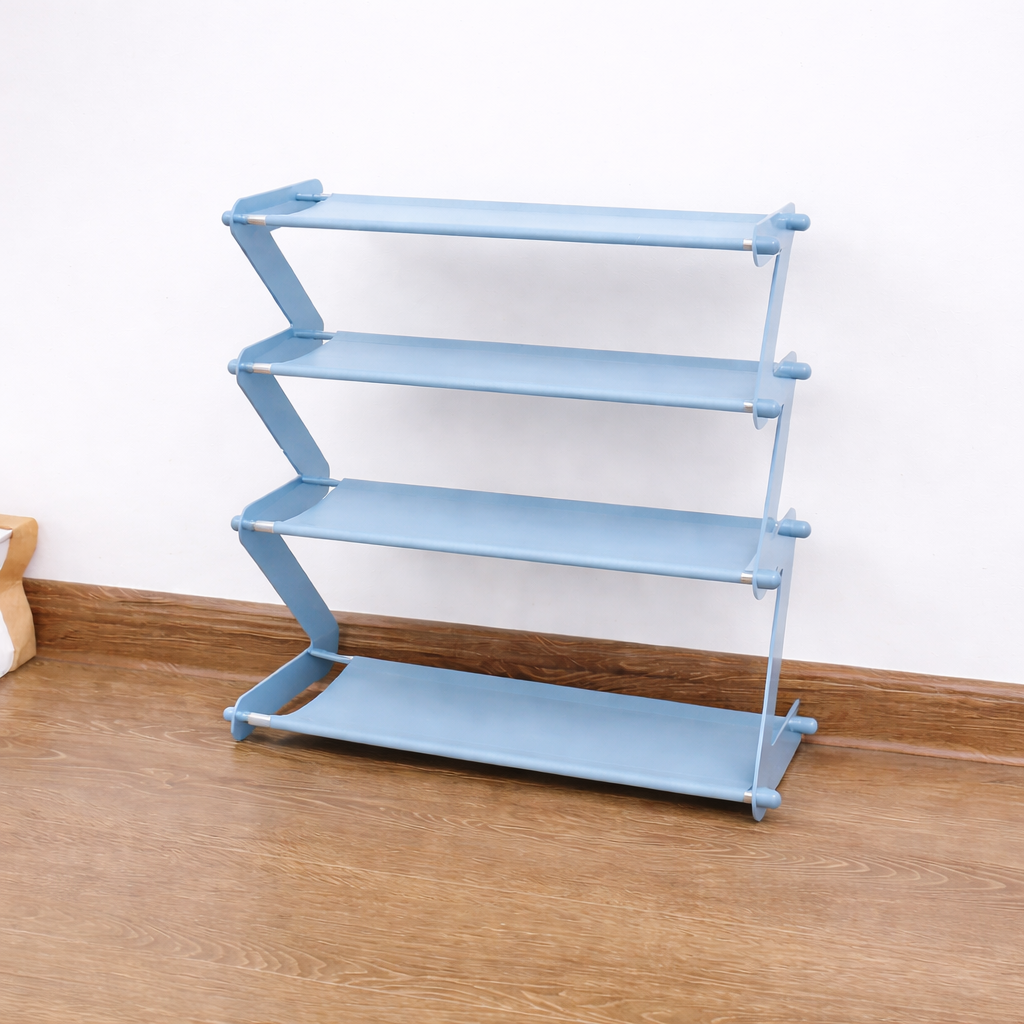 Light blue shoe rack with four shelves on a wooden floor against a white wall.